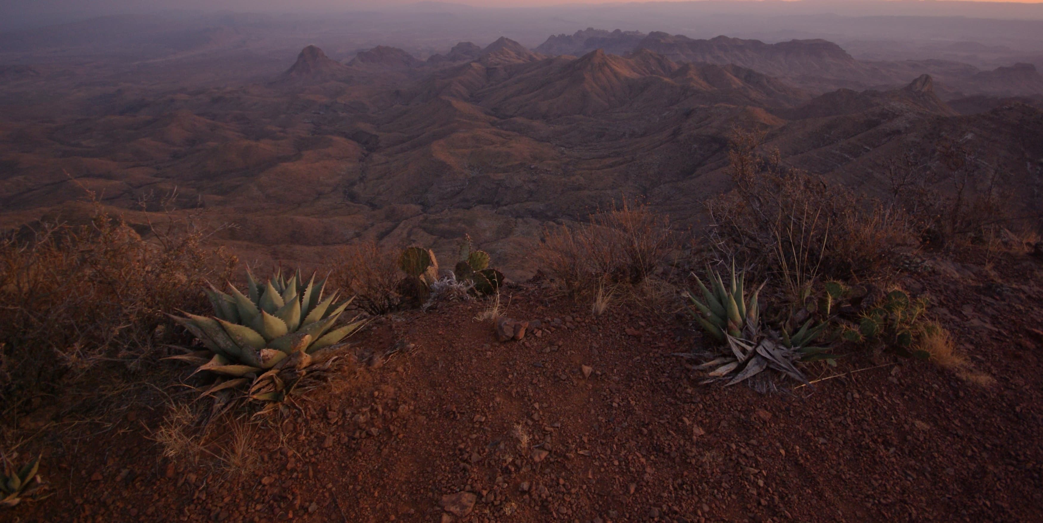 Sunset over the layered Chisos ridges seen from the South Rim of Big Bend National Park