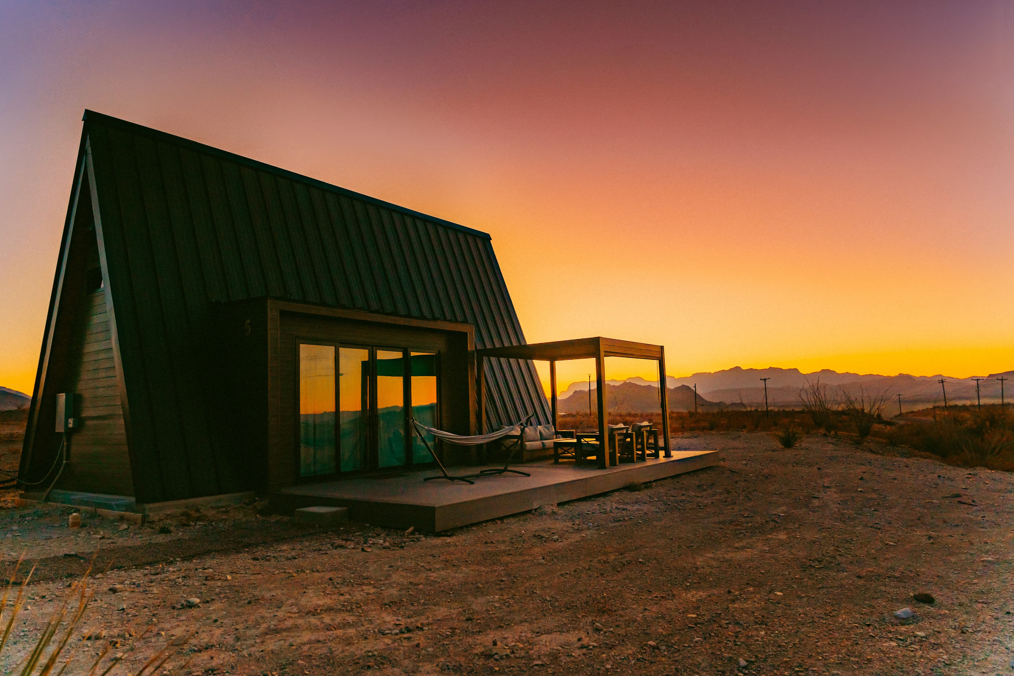 A-frame cabin at sunset in Terlingua, Texas