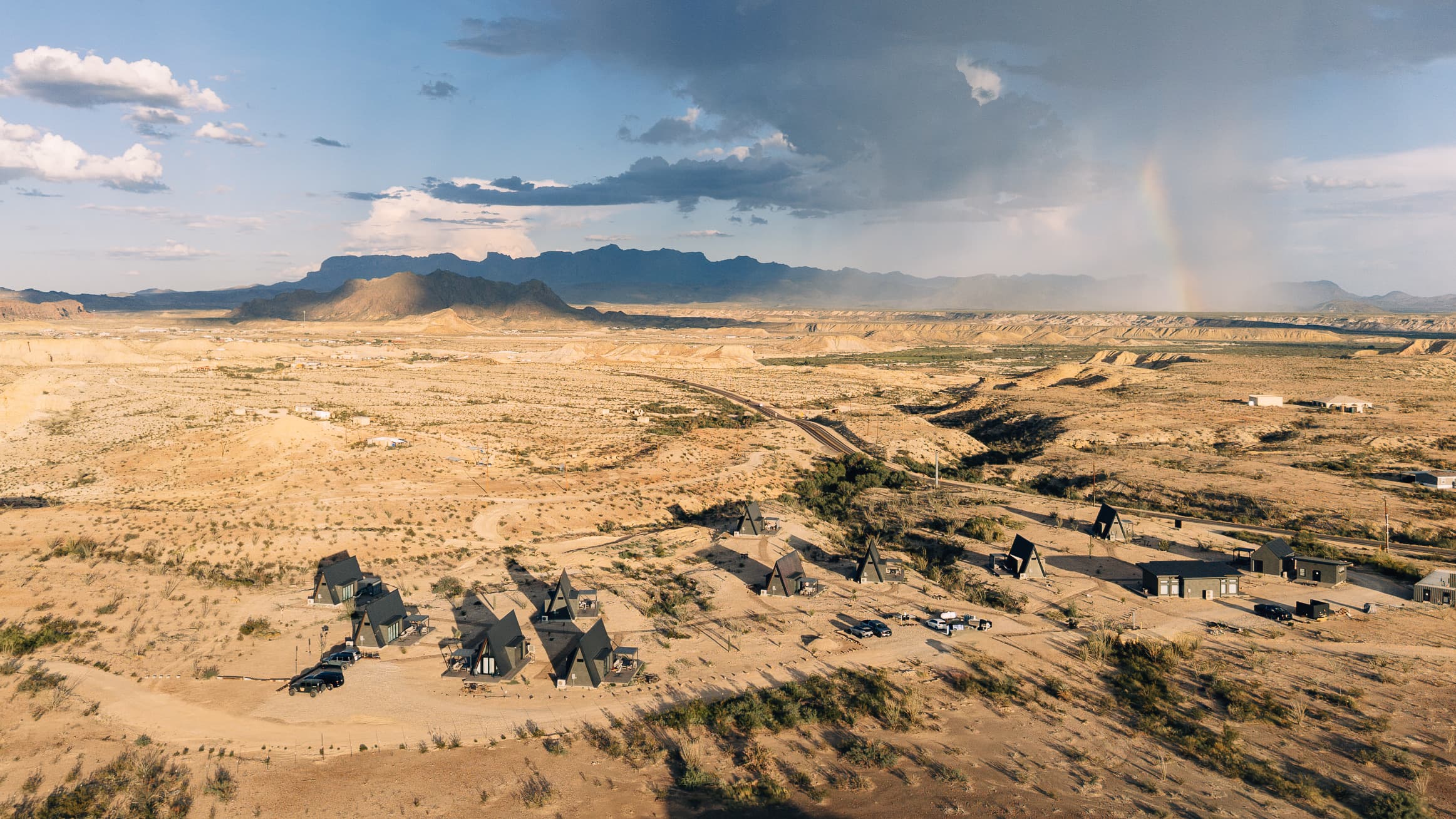 Aerial view of the Stardust Big Bend property with the Chisos Mountains behind